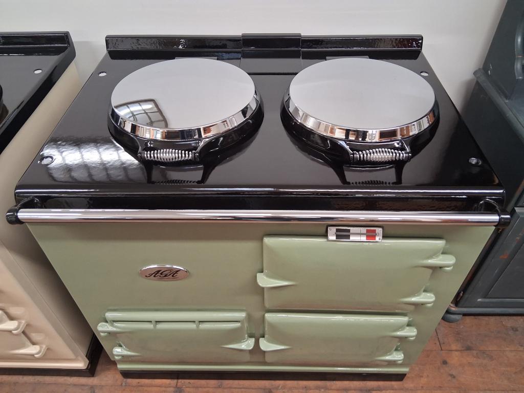 <p>2 Oven Aga cooker with plinth</p><p>Fully reconditioned </p><p>Enamelled in Olivine</p><p>Electrickit control system