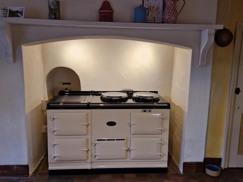 <p>4 Oven Electric Aga in Cream installed near Axminster