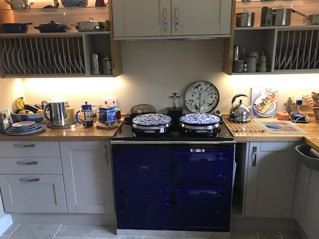 A fully restored four oven Aga with blue enamel